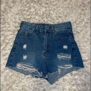 Blue ripped denim shorts